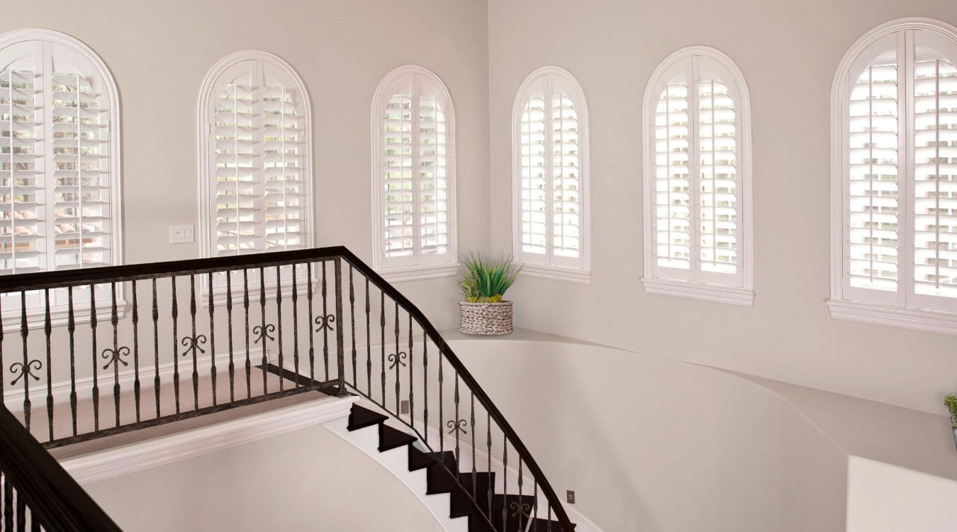 Plantation shutters over a stairwell